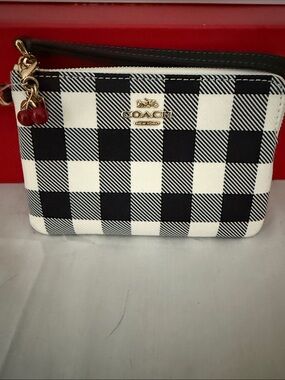 Coach Black and White Check Wristlet with Cherry Charm